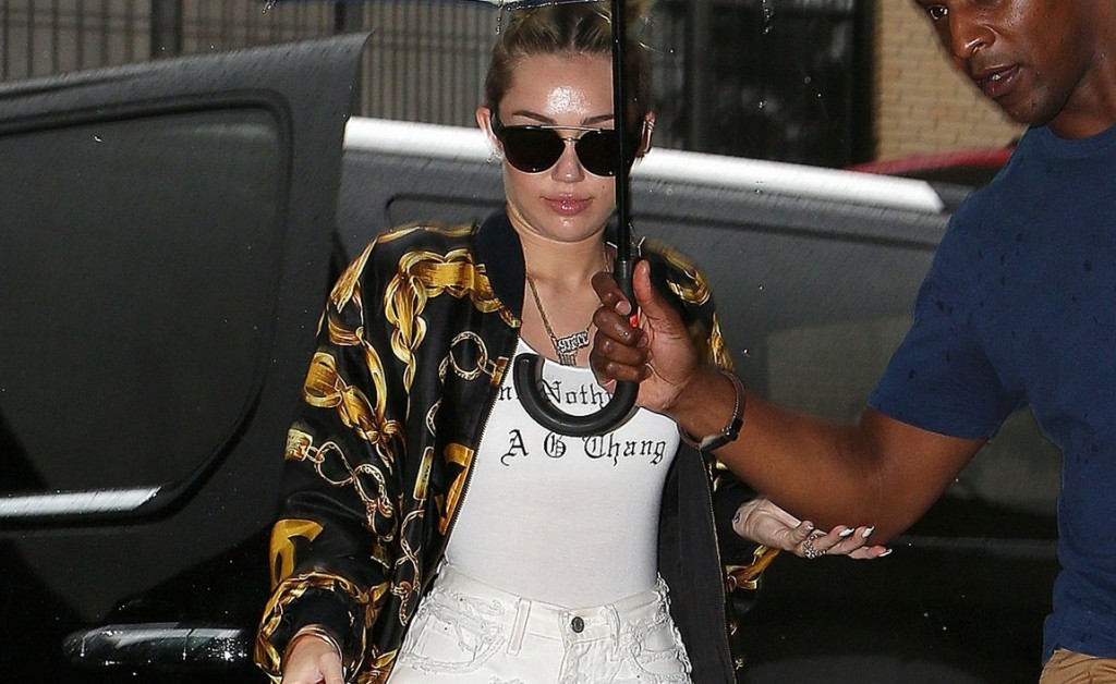 Miley Cyrus goes to studio in the rain in NYC Pictured: Miley Cyrus 