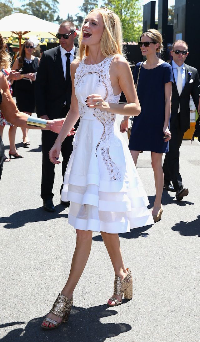 Poppy Delevingne is rocking a J'Aton Couture dress, filigree crown by Dolce & Gabbana, Givenchy shoes 