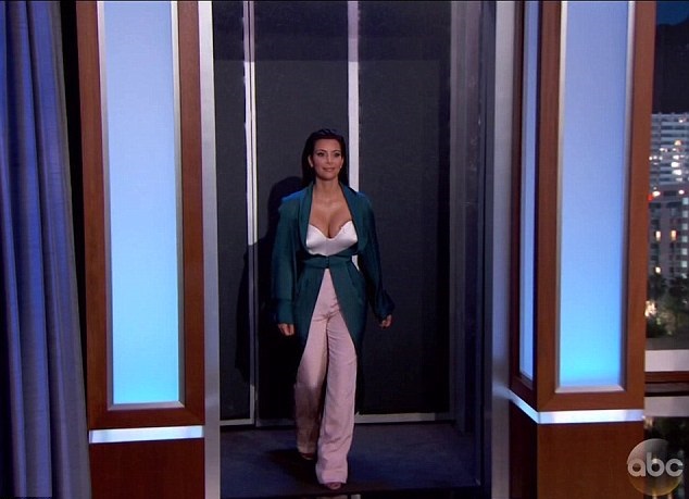Kim-Kardashian-In-Ulyana-Sergeenko-Spring-2014-Couture-Emerald-Green-Silk-Jacket-and-Pink-Trousers-on-Jimmy-Kimmel-Live-10