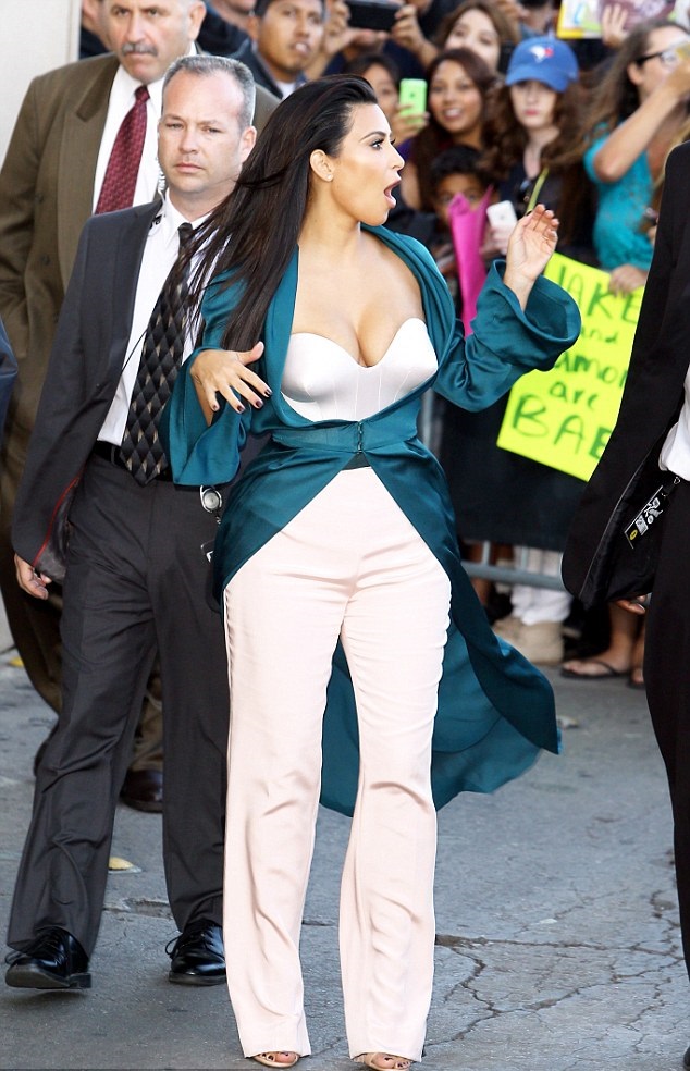 Kim-Kardashian-In-Ulyana-Sergeenko-Spring-2014-Couture-Emerald-Green-Silk-Jacket-and-Pink-Trousers-on-Jimmy-Kimmel-Live-7