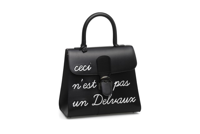 Delvaux Brillant MM plain black leather handbag.