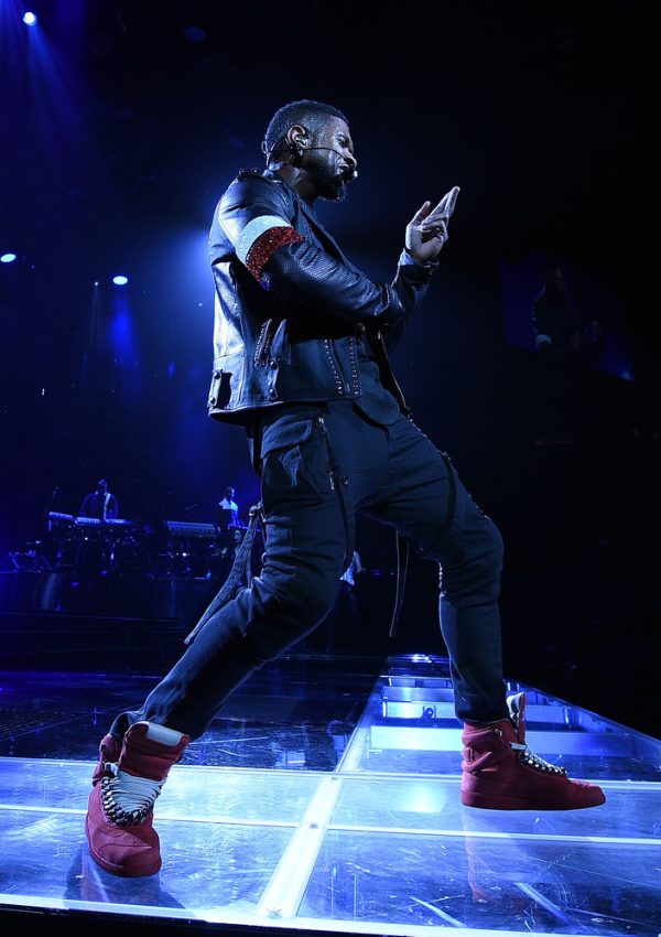 Usher in  Maison Martin Margiela Chain Sneakers  and  Pyer Moss Custom Biker Jacket on Tour