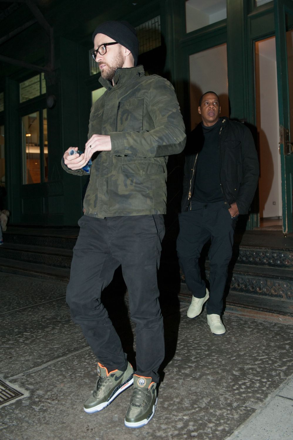 Justin Timberlake and Jay-Z are seen leaving Taylor Swift’s apartment building in New York City, 15 December 2014.