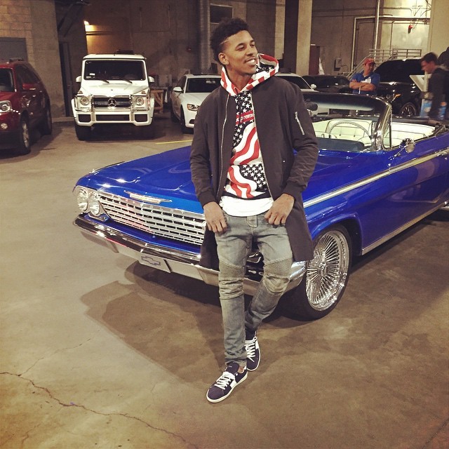 Nick-Young-in-Fear-of-God-LA-jacket-Supreme-Hoodie-Balmain-Jeans-and-Saint-Laurent-low-top-sneakers-shoes