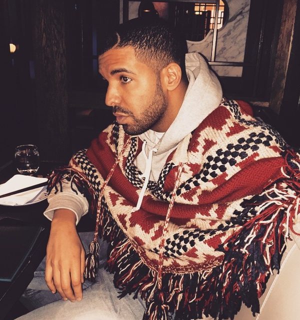 Drake wearing  Chanel Poncho Sweater