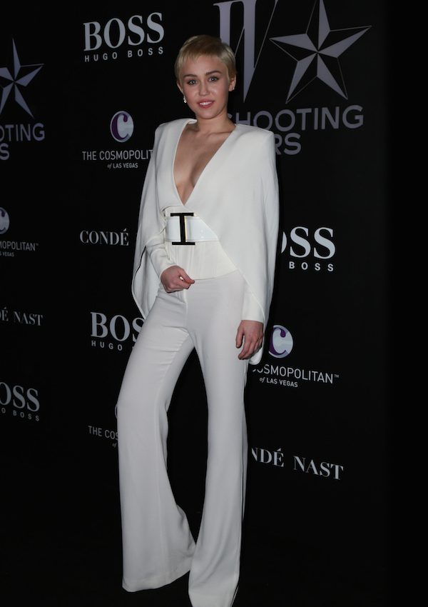 Miley Cyrus wears  Balmain – Magazine Shooting Stars Exhibit Opening