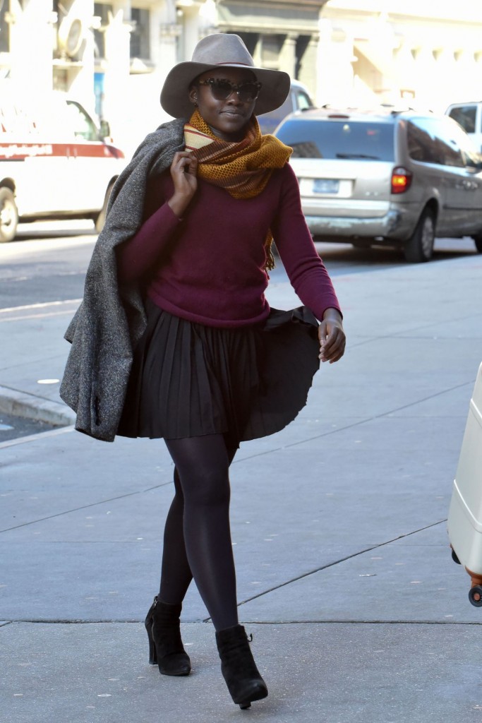 lupita-nuong-o-in-mini-pleated-dress-and-purple-top-at-public-theater-in-nyc-november-2015_1-683×1024