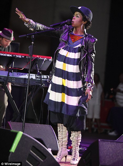 Lauryn Hill shows off her baby bump as she performs at Chene Park 