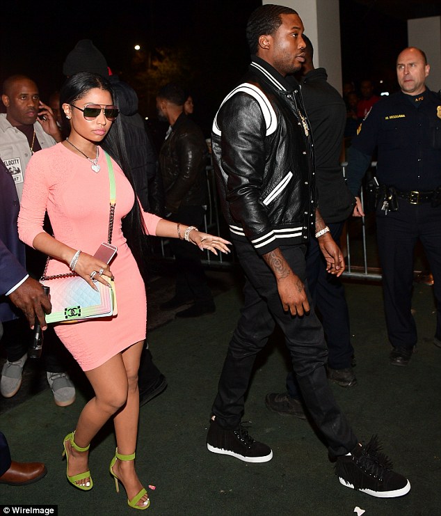 She stepped out on Friday to support her main squeeze Meek Mill. And Nicki Minaj made sure to stand out in the crowd with her candy colored ensemble while arriving to the Gold Room in Atlanta, Georgia. Read more: http://www.dailymail.co.uk/tvshowbiz/article-3997776/Nicki-Minaj-stuns-Versace-mini-4-5K-Chanel-bag-beau-Meek-s-bash-shares-steamy-PDA-snap-him.html#ixzz4RuG89iQr Follow us: @MailOnline on Twitter | DailyMail on Facebook