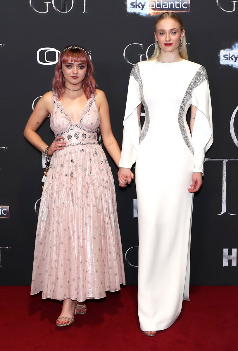 Maisie Williams (in Coach) and Sophie Turner (in Louis Vuitton) @ ‘Game of Thrones’ Season 8 Belfast Premiere