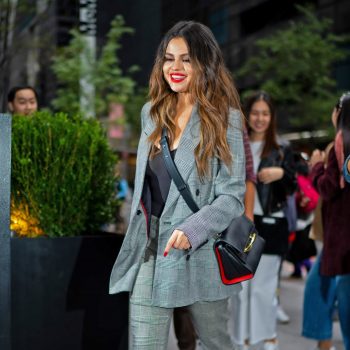 selena-gomez-in-checkered-frame-suit-arriving-to-iheart-radio-in-new-york