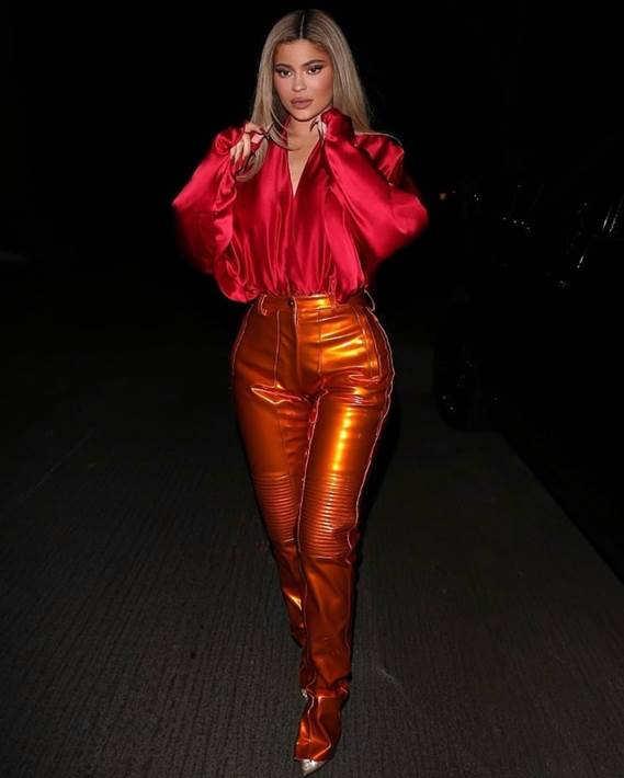 kylie-jenner-wearing-laquan-smith-red-silk-top-and-orange-pvc-pants-out-in-beverly-hills
