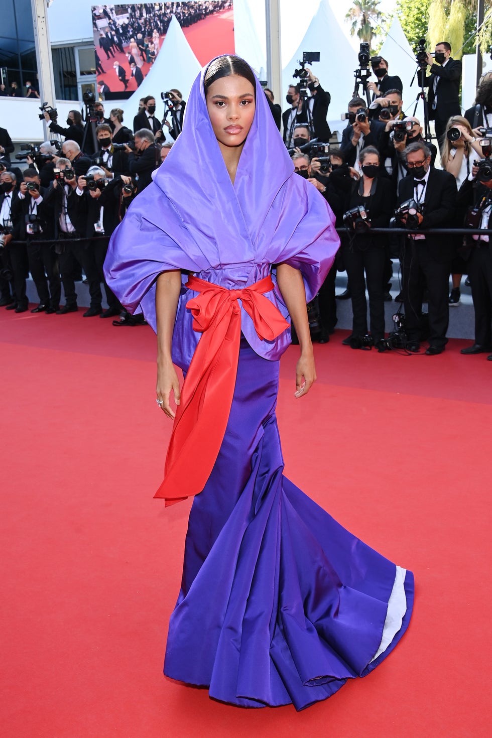 Tina Kunakey Wears Valentino Haute Couture @  ‘Benedetta’ Cannes Film Festival  Premiere