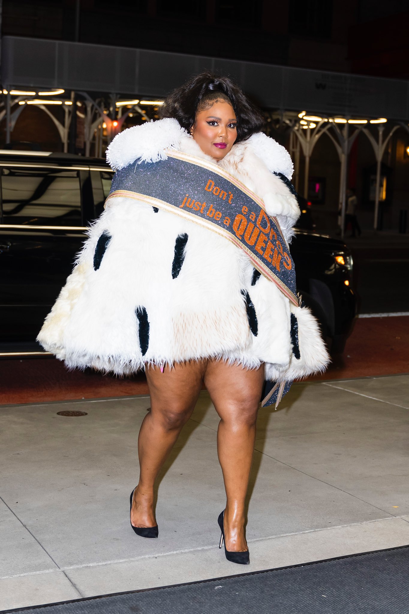 lizzo-wears-viktorrolf-dont-be-a-drag-just-be-a-queen-coat-in-new-york