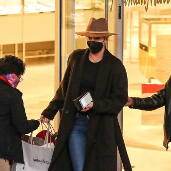 charlize-theron-wears-fedora-trench-coat-leaving-neiman-marcus