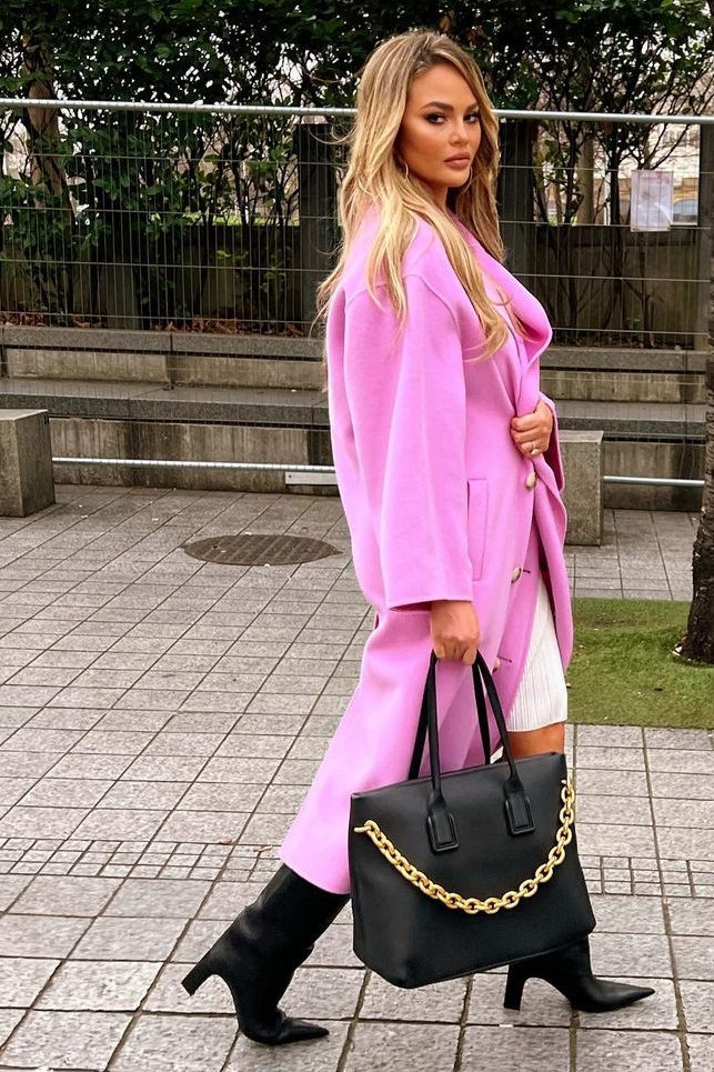 chrissy-teigen-wears-pink-coat-instagram-january-1-2022