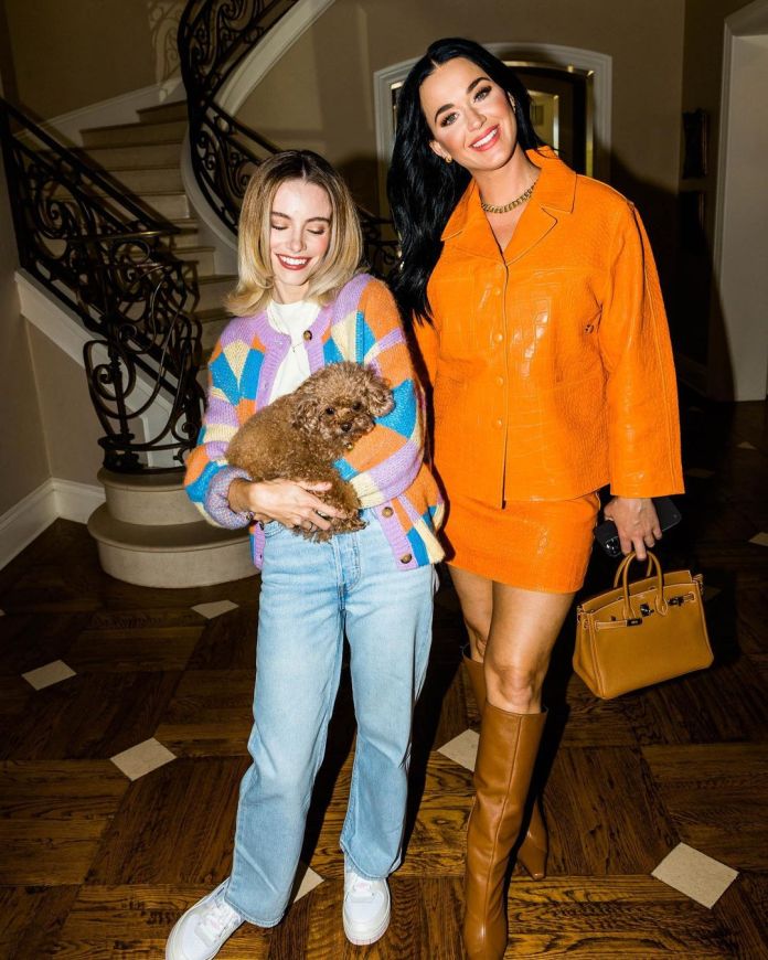 Katy Perry in Orange  Leather Jacket and  Orange Mini Skirt