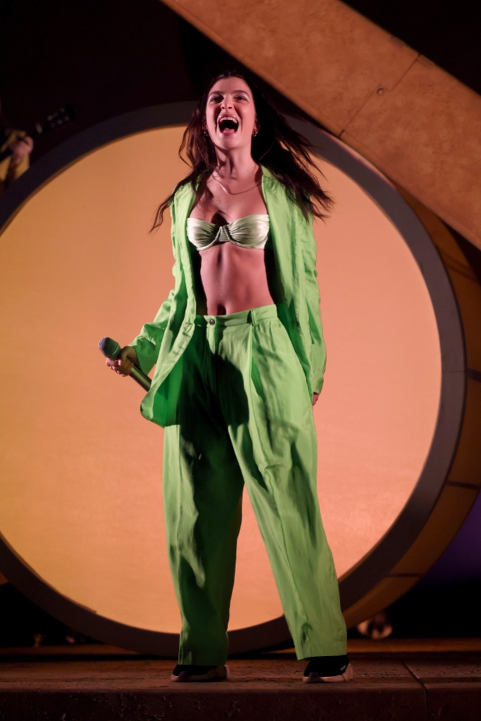 Lorde performs  in green suit @ ‘Lorde World Tour’ Opening Night in Nashville, Tennessee