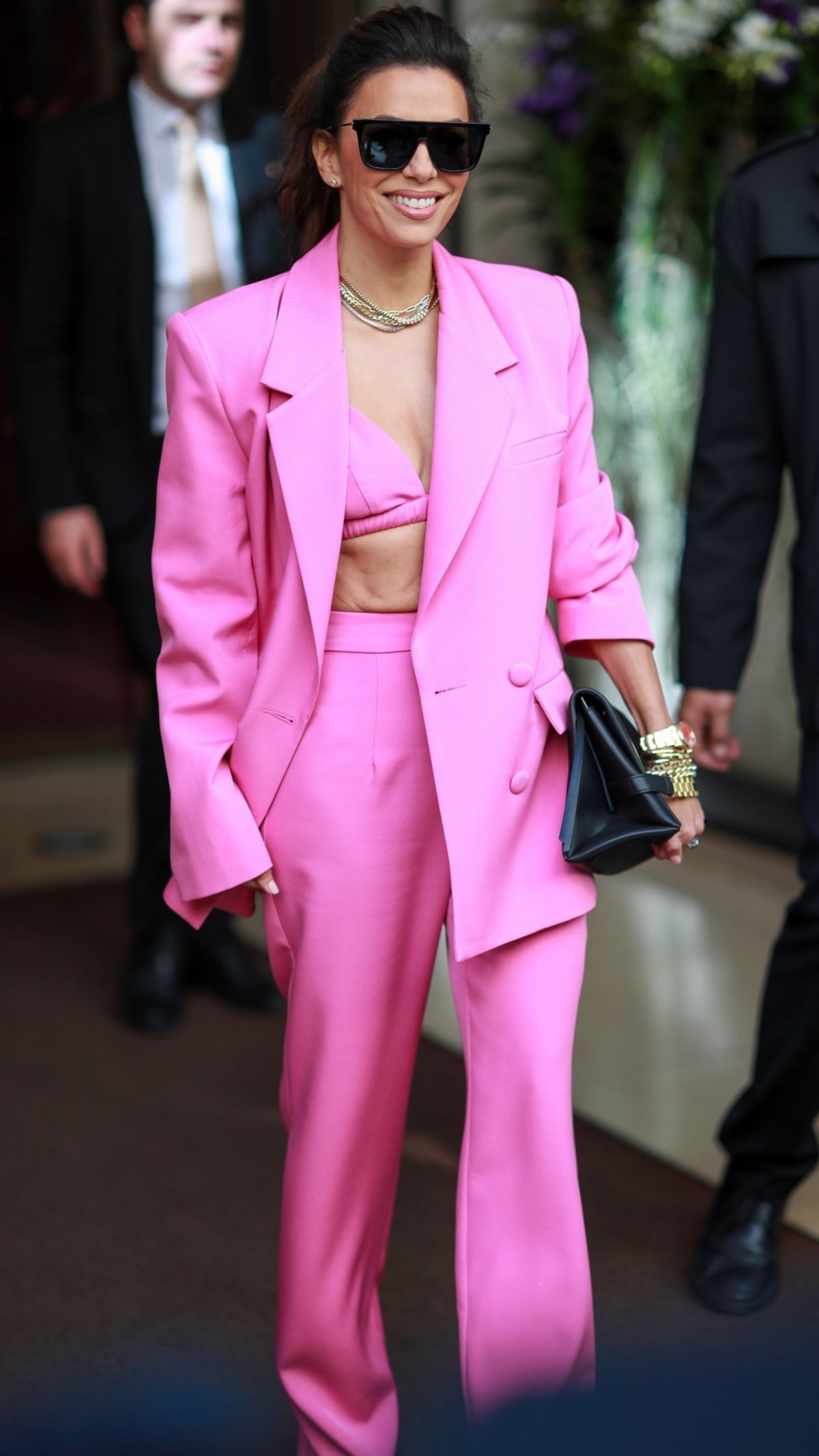 EVA LONGORIA  wears Pink Suit  leaving Mandarin Oriental Hotel in Paris
