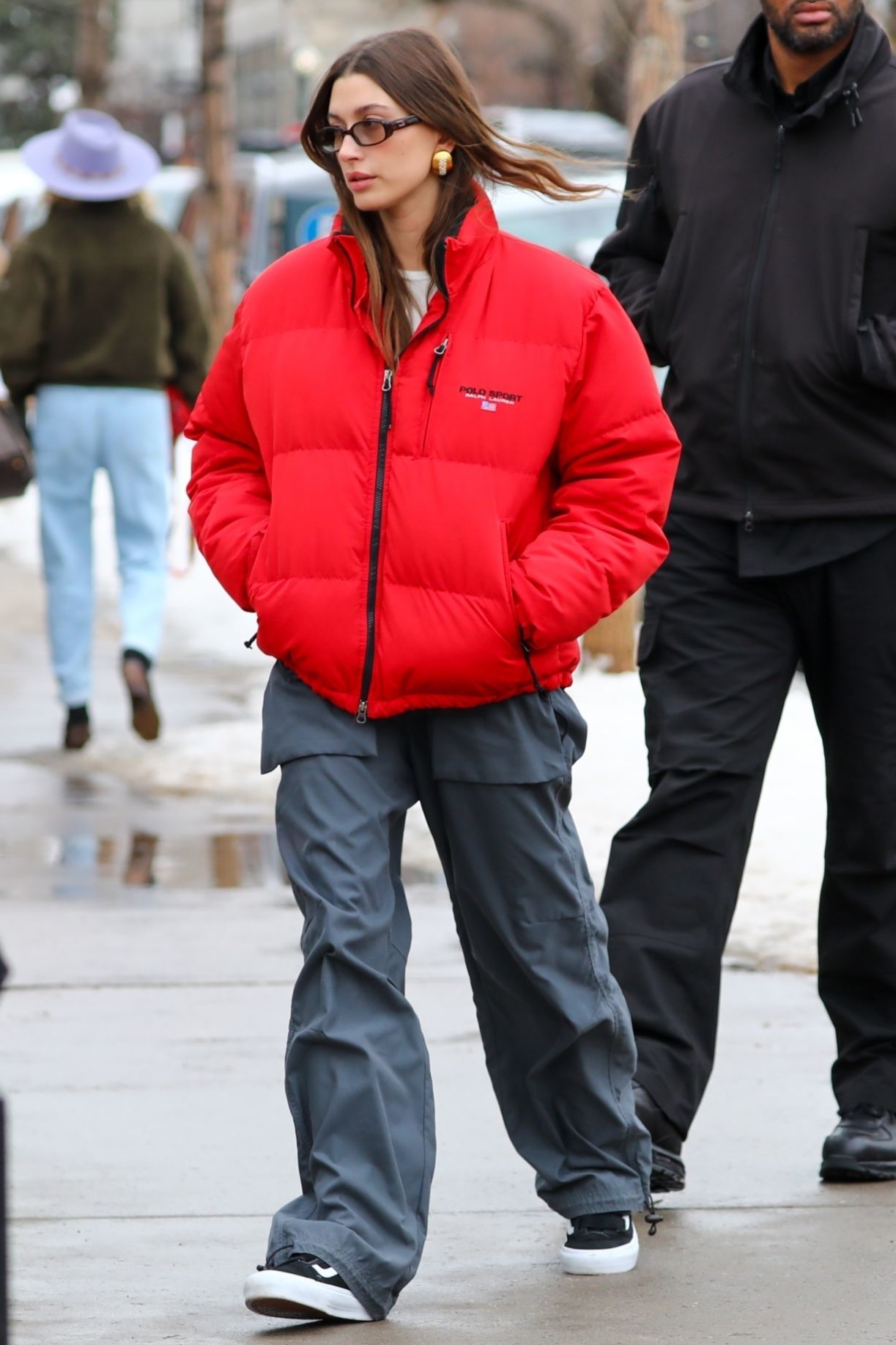 Hailey Bieber wears Red Ralph Lauren Puffer Jacket Out In  Aspen 1/1,/2023