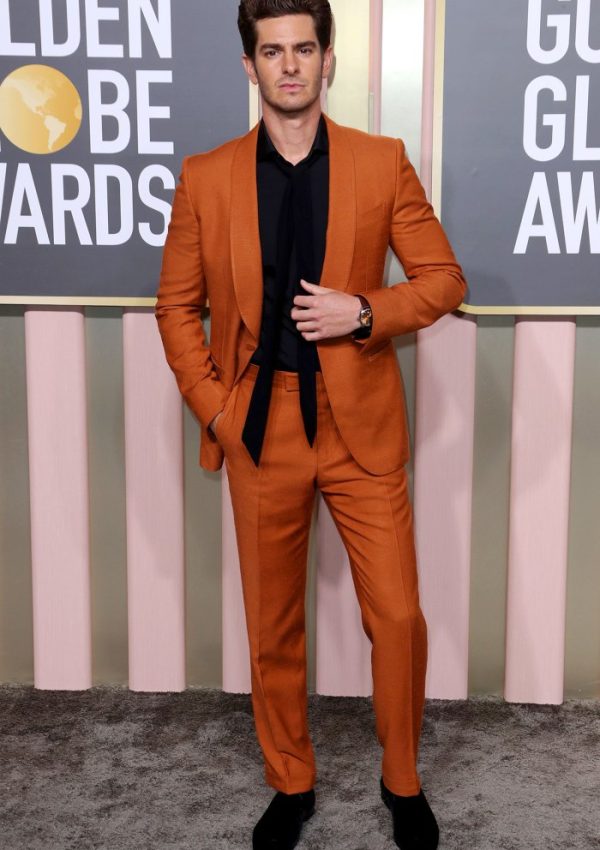 Andrew Garfield  wore a dark orange  Zegna suit  @ Golden Globes 2023