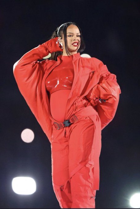 Rihanna wore Red custom Alaïa coats  @ Superbowl 2023