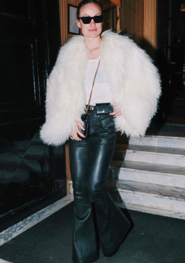 Olivia Wilde wears Magda Butrym Shearling Coat & Flared Pants Out In Paris  2023