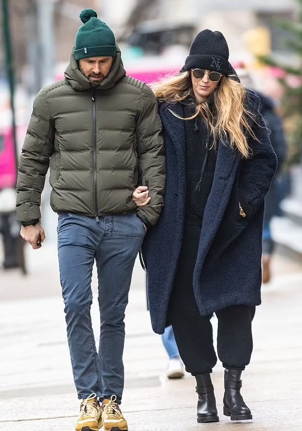 Blake Lively in navy teddy coat & black ankle boots  @ NY on March 15