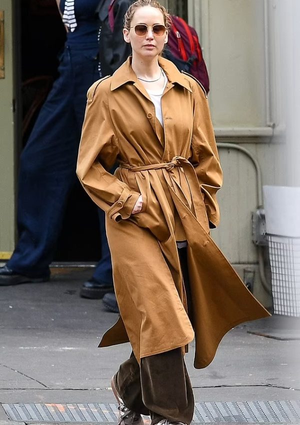 Jennifer Lawrence  wears Belted Trench Coat  & Sneakers @ New York March 22, 2023