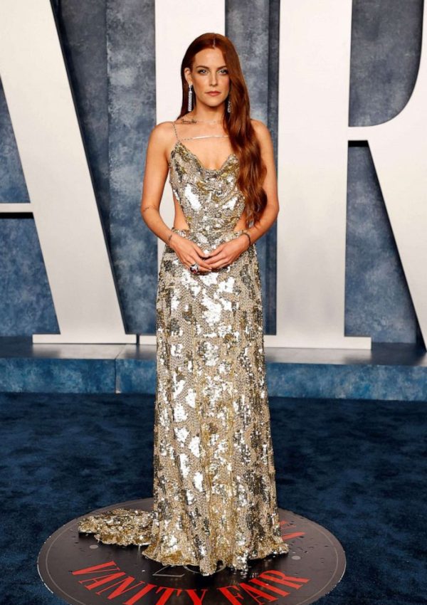 Riley Keough wore gold sequin CELINE Gown @ 2023 Vanity Fair Oscar Party