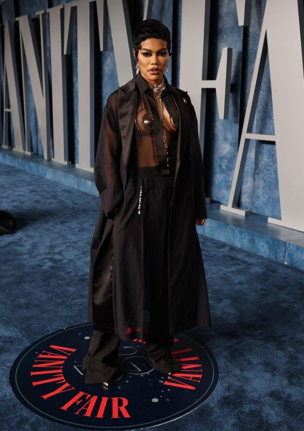 Teyana Taylor  wore sheer duster coat @ Vanity Fair Oscars Party 2023