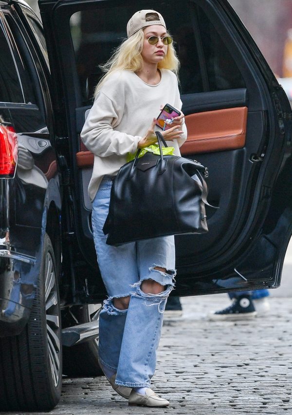 Gigi Hadid  carries  Givenchy Travel Bag @ New York  March 29, 2023