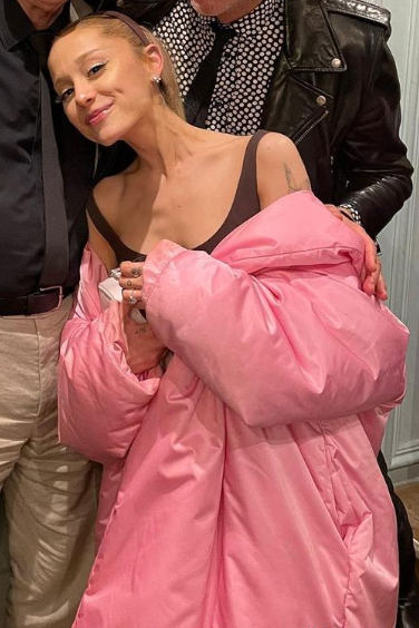 Ariana Grande wore  Pink  Balenciaga  Puffer Coat @ London April 7, 2023