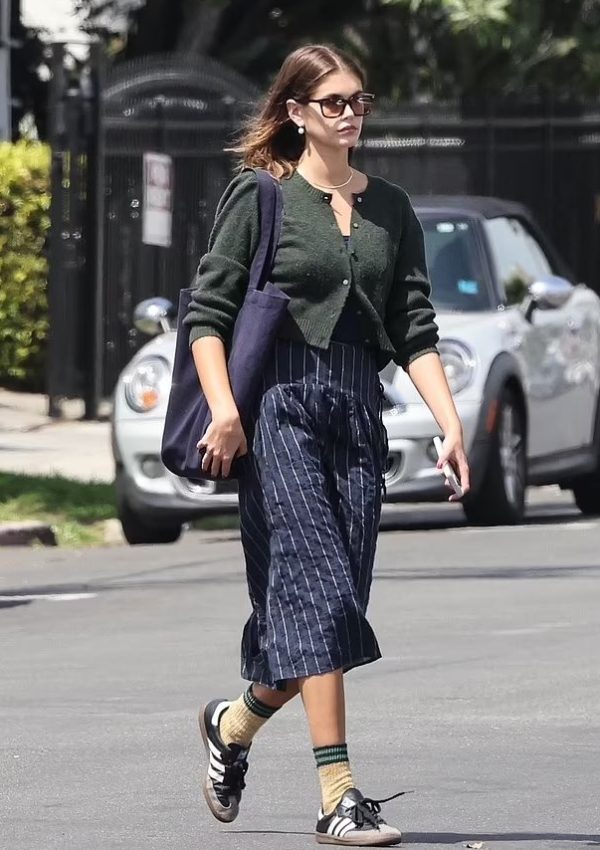 Kaia Gerber in Pinstripe Skirt &  Adidas Sneakers out in Los Angeles April 9, 2023