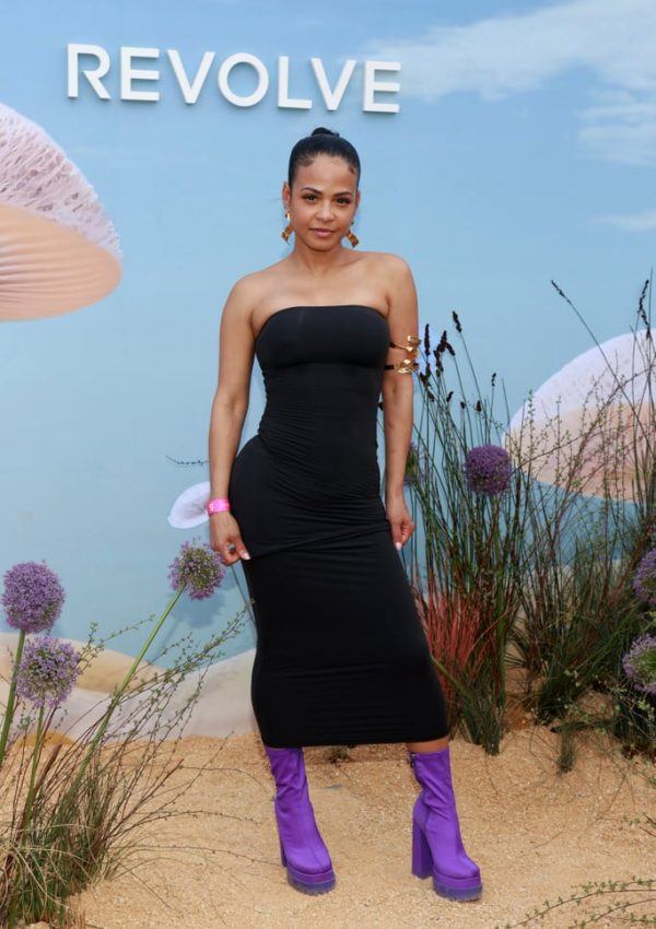 Christina Milian wore black tube dress & purple platform boots @ 2023 Revolve Coachella  Festival