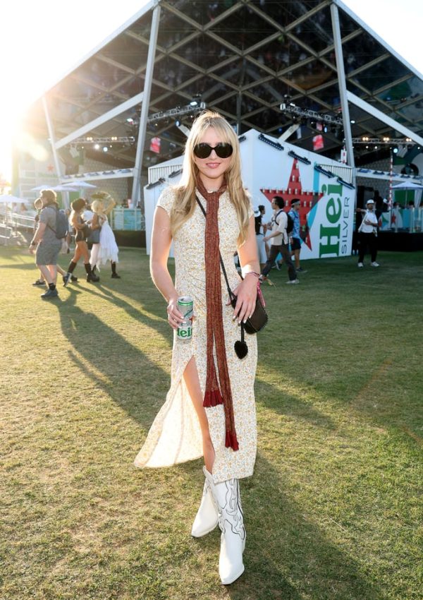 Kathryn Newton wore Reformation dress & white cowboy boots @ Heineken House  Coachella 2023
