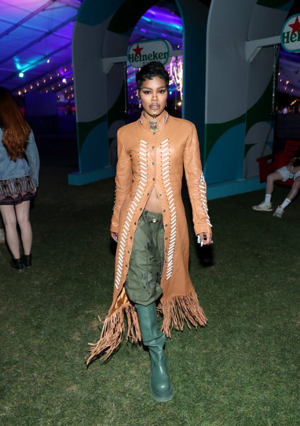 Teyana Taylor in baggy cargo pants, & leather fringe jacket @ Heineken House at Coachella weekend one