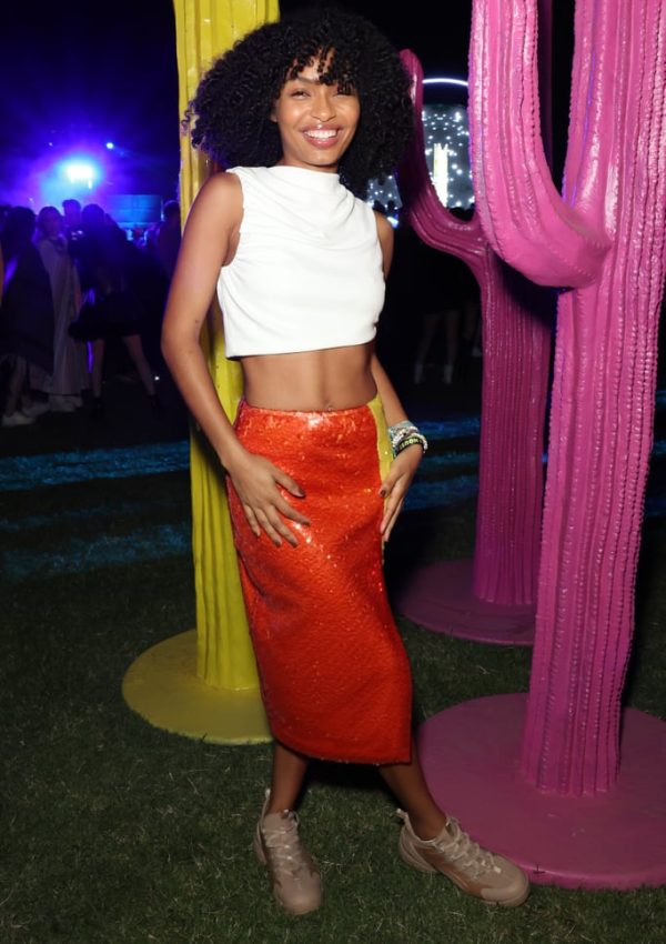 Yara Shahidi  in sequin skirt, and Dior sneakers @ Nylon House during Coachella  2023