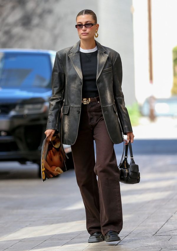 Hailey  Bieber in  Distressed Black Leather Jacket and Jeans @ Beverly Hills 04/06/2023