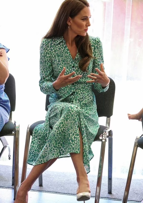 Kate Middleton wore  Green Cefinn leopard print dress for visit to children’s health centre In  Nuneaton