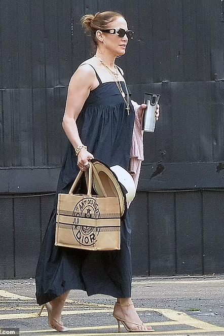 Jennifer Lopez carries Large Dior Book Tote Out in La.A on Feb.2.2023