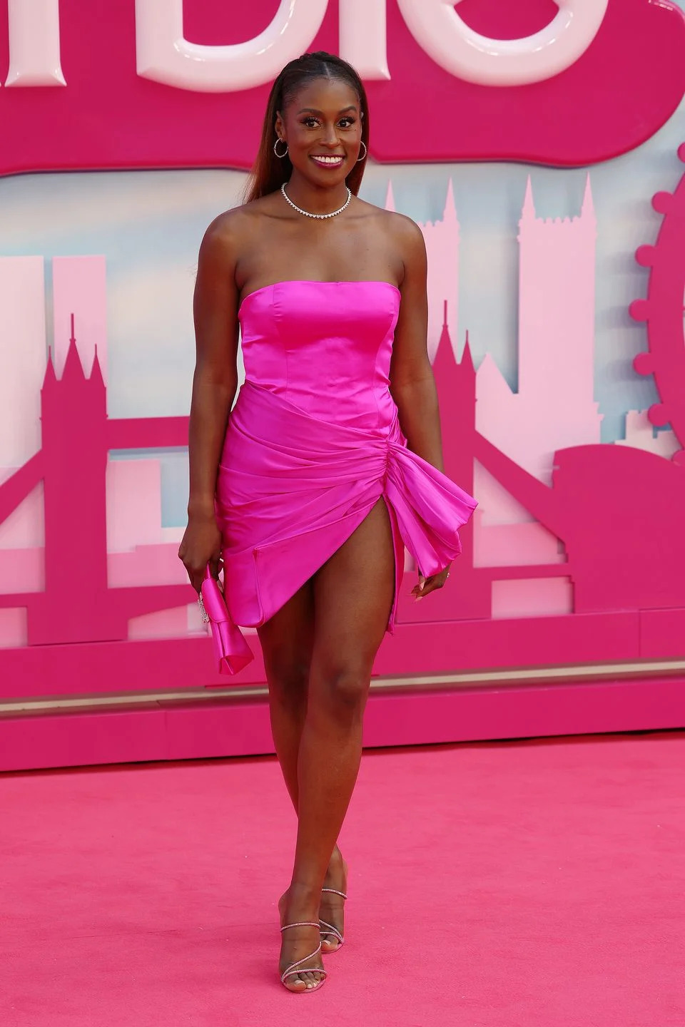 Issa Rae Pops in Pink Miniskirt & Platforms at Barbie London Photocall –  Footwear News