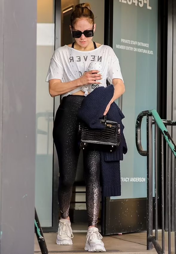 Jennifer Lopez carries  Hermes Crocodile Birkin Bag in  LA November 28, 2023