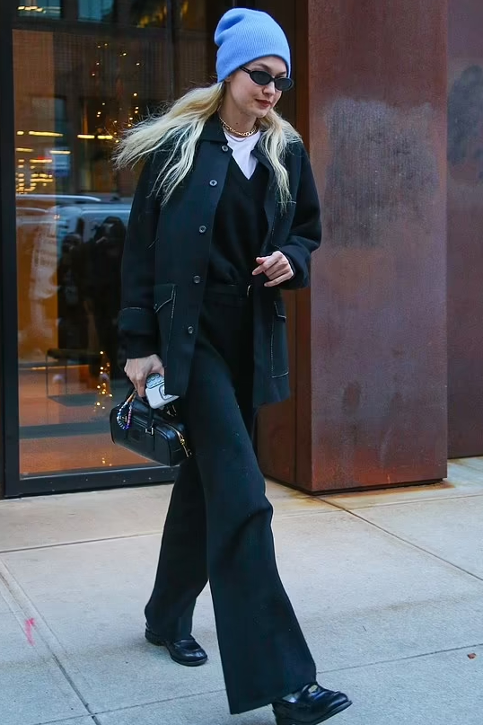 Gigi Hadid   carries  Miu Miu Bag @ New York City December 19, 2023