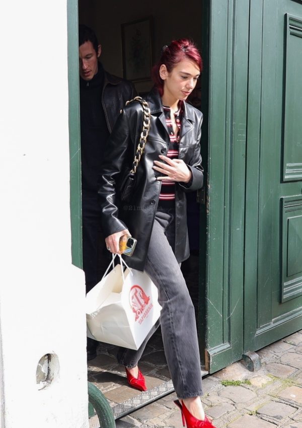 Dua Lipa  carries Chanel  Bag in Paris March 25, 2024