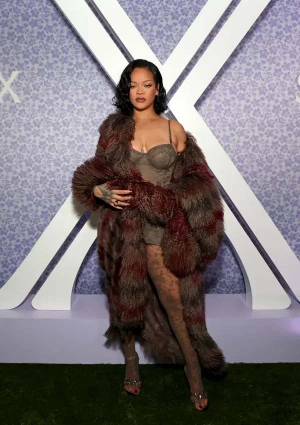 Rihanna  in  Fendi patchwork Mongolian shearling coat at her launch party 2024