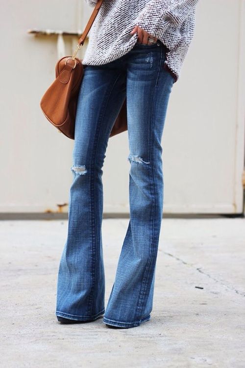 Wear your wide legs with a slouchy sweater and heeled boots for a look that flatters your figure