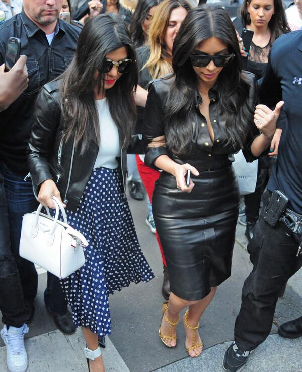 Kim and Kourtney leaving L'Avenue in Paris